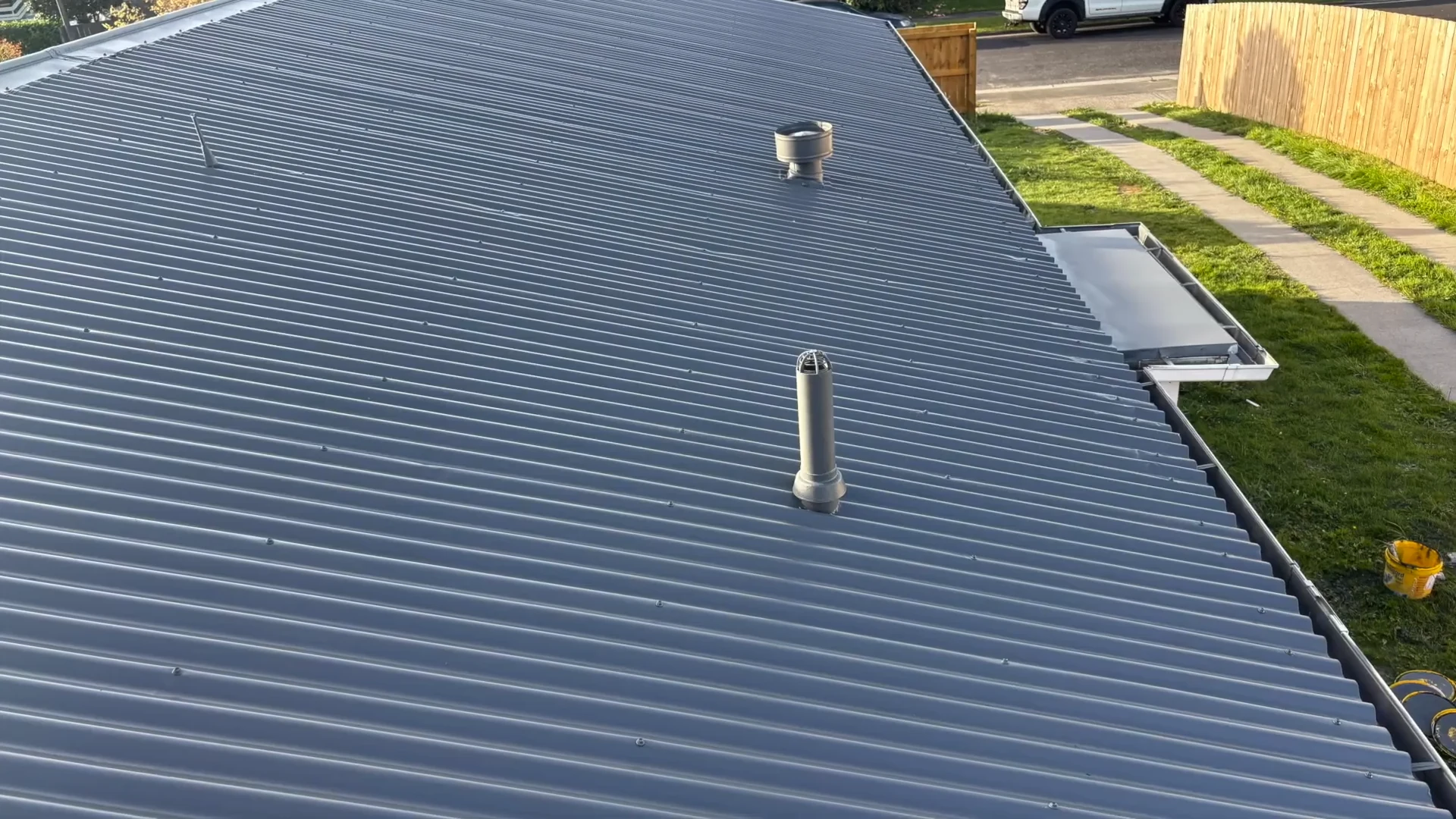Dark protective coating across the completed corrugated roof at Chartwell, Hamilton