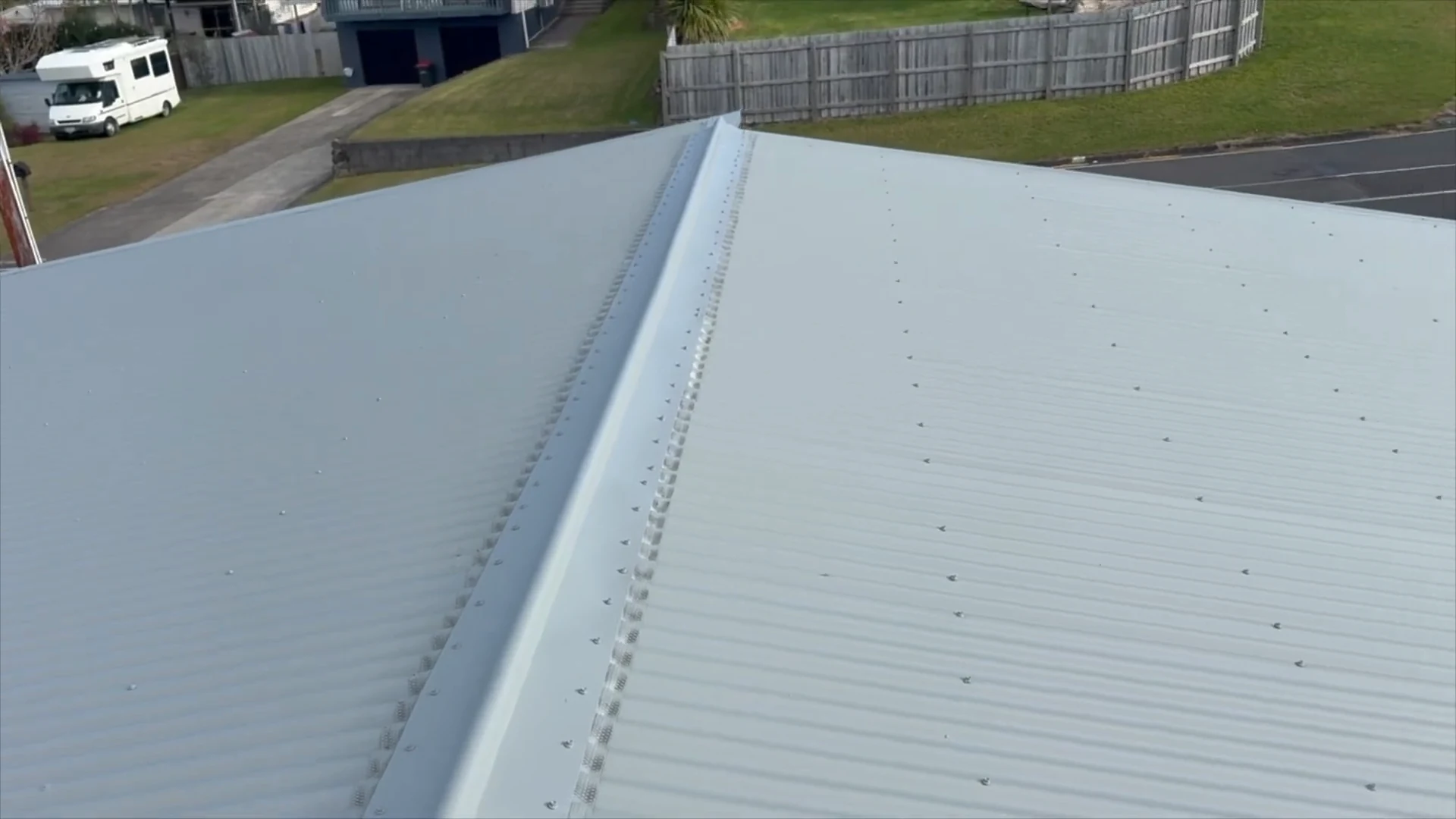 The repaired ridge and finished coating on the corrugated iron roof at Pukehangi, Rotorua